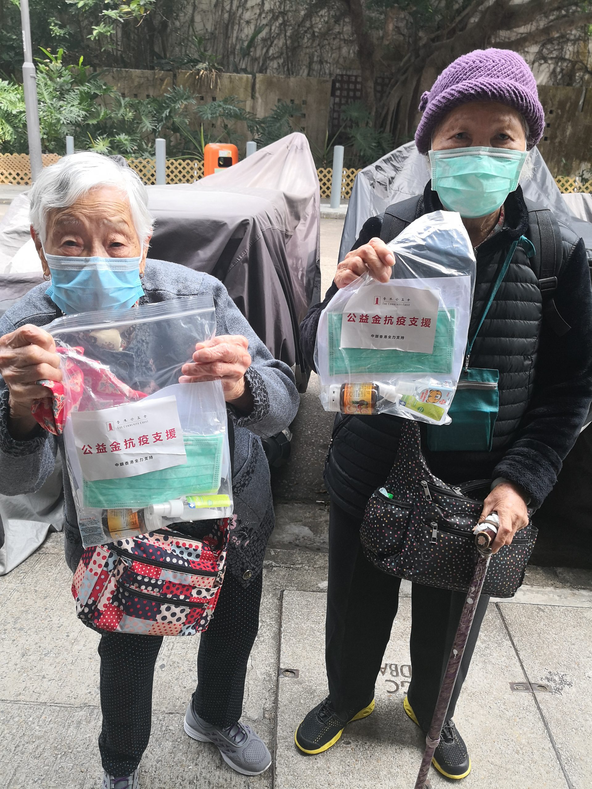 Giving face masks and health kits to needy